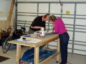 Dolly runs the rivet gun while do the bucking