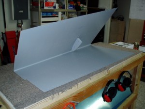Interior nose rib riveted to left side HS skin.